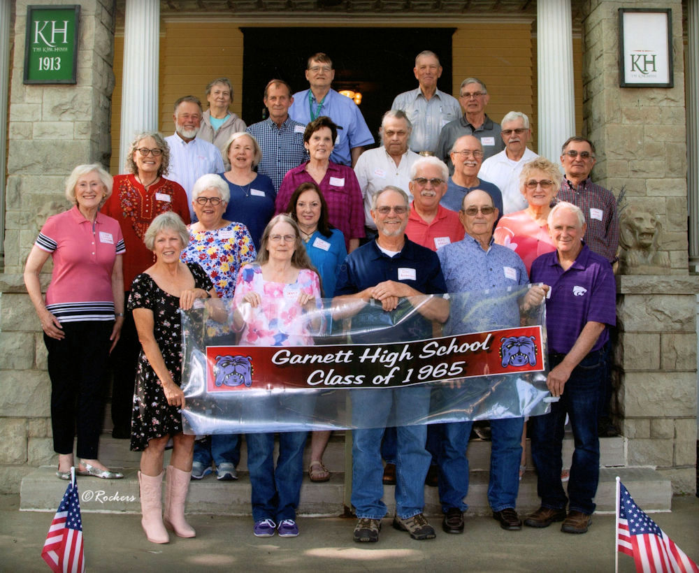group photo on front porch of the Kirk House